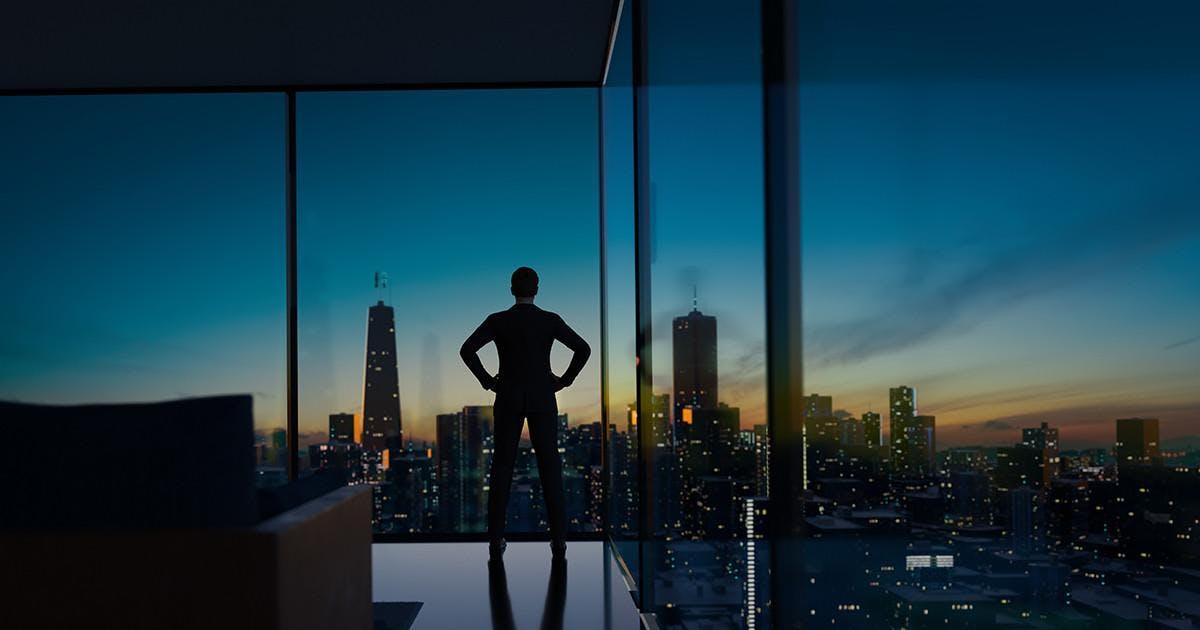 Young business man standing in the office watching the modern city sunrise view outside the window, business ambition concept. 3d rendering